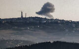 A smoke plume billows following an Israeli strike in south Lebanon from a position along the border in northern Israel on June 18, 2024.  (Jalaa MAREY / AFP)