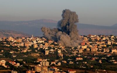 Black smoke billows after an Israeli air strike that targeted a house in the southern Lebanese village of Khiam, near Israel's northern border with Lebanon, June 21, 2024. (Rabih Daher / AFP)