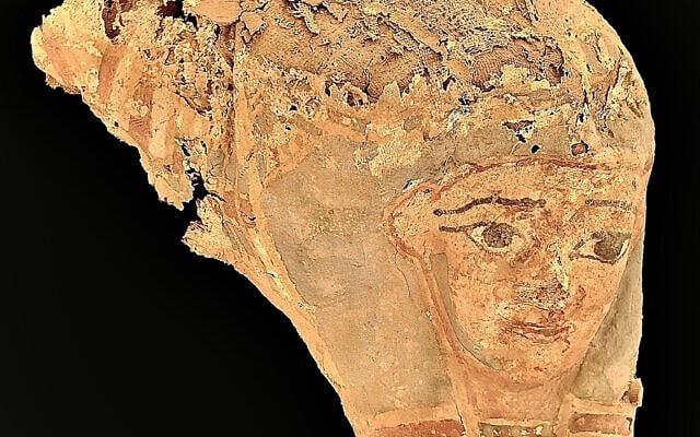 This handout picture released by the Egyptian Ministry of Tourism and Antiquities on June 24, 2024 shows the top fragment of a sarcophagus discovered at the site of a discovery of 33 ancient tombs in Egypt's southern city of Aswan. (Egyptian Ministry of Antiquities/AFP) This handout picture released by the Egyptian Ministry of Tourism and Antiquities on June 24, 2024 shows the top fragment of a sarcophagus discovered at the site of a discovery of 33 ancient tombs in Egypt's southern city of Aswan. (Egyptian Ministry of Antiquities/AFP)