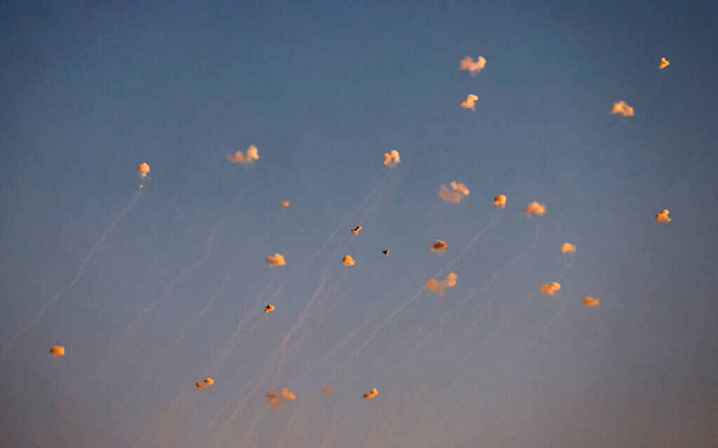 Rockets fired from southern Lebanon by Hezbollah are intercepted by the Iron Dome over the Upper Galilee on June 27, 2024. (Jalaa Marey/AFP)