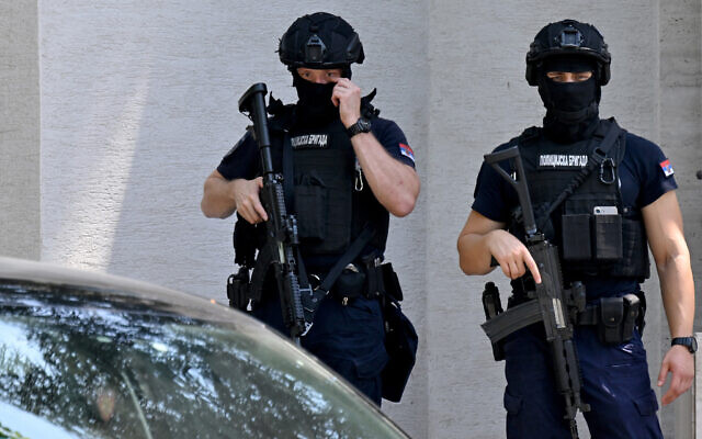 Armed Serbian police officers are stationed close to Israel's embassy in Belgrade, June 29, 2024. (Oliver Bunic/AFP)