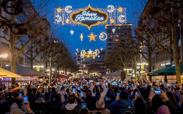 A 'Happy Ramadan' sign is illuminated on the occasion of the beginning of the month of Ramadan in a pedestrian zone in Frankfurt, Germany, March 10, 2024. (AP Photo/ Michael Probst) A 'Happy Ramadan' sign is illuminated on the occasion of the beginning of the month of Ramadan in a pedestrian zone in Frankfurt, Germany, March 10, 2024. (AP Photo/ Michael Probst)