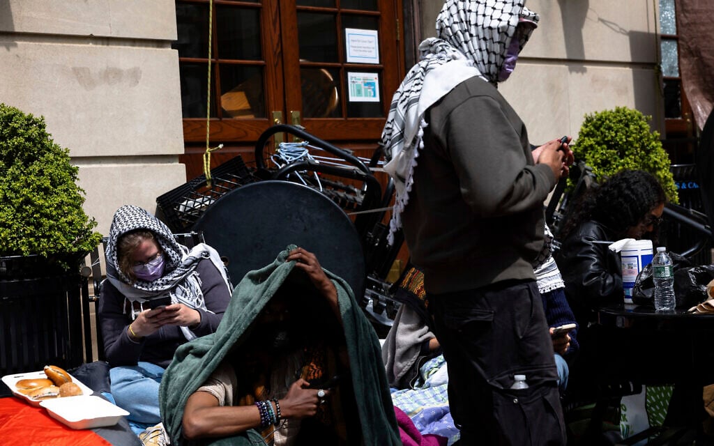 Pro-Palestinian, anti-Israel protesters occupy space at an entrance to Hamilton Hall at Columbia University on Tuesday, April 30, 2024, in New York. (Michael M. Santiago/Pool Photo via AP) Pro-Palestinian, anti-Israel protesters occupy space at an entrance to Hamilton Hall at Columbia University on Tuesday, April 30, 2024, in New York. (Michael M. Santiago/Pool Photo via AP)