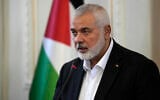 Hamas chief Ismail Haniyeh speaks during a press briefing after his meeting with Iranian Foreign Minister Hossein Amirabdollahian in Tehran, Iran, March 26, 2024. (AP Photo/Vahid Salemi)