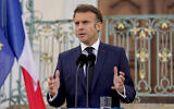 French President Emmanuel Macron speaks at a news conference at the German government guest house in Meseberg, north of Berlin, Germany, May 28, 2024. (AP Photo/Ebrahim Noroozi)