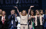 Italian Premier Giorgia Meloni, center, and Brothers of Italy fellow party members and candidates wave from the stage during an electoral rally ahead of the EU parliamentary elections in Rome, June 1, 2024. (AP/Alessandra Tarantino)