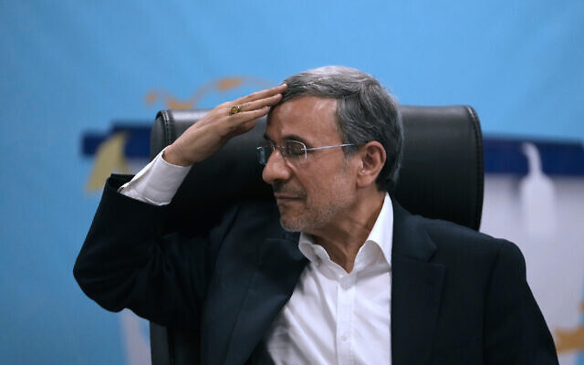 Iran's hardline former president Mahmoud Ahmadinejad puts his hand on his head as a gesture of respect to the media while registering his name as a candidate for the June 28 presidential election at the Interior Ministry, in Tehran, Iran, June 2, 2024. (AP Photo/Vahid Salemi) Iran's hardline former president Mahmoud Ahmadinejad puts his hand on his head as a gesture of respect to the media while registering his name as a candidate for the June 28 presidential election at the Interior Ministry, in Tehran, Iran, June 2, 2024. (AP Photo/Vahid Salemi)