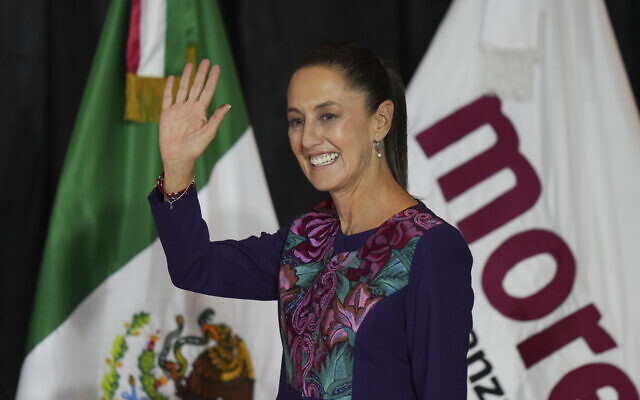 Ruling party presidential candidate Claudia Sheinbaum greets supporters after the polls closed during general elections in Mexico City, early Monday, June 3, 2024. (AP Photo/Fernando Llano) Ruling party presidential candidate Claudia Sheinbaum greets supporters after the polls closed during general elections in Mexico City, early Monday, June 3, 2024. (AP Photo/Fernando Llano)