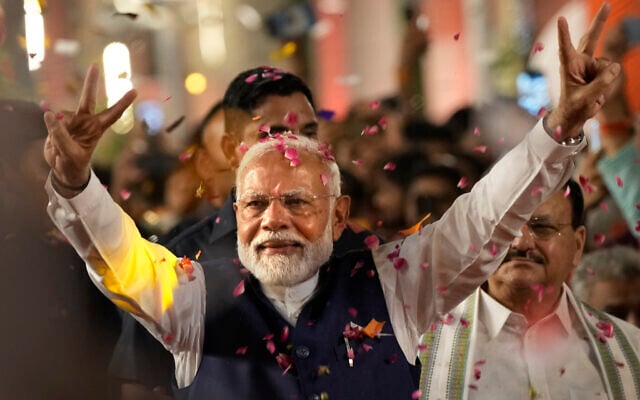 Prime Minister Narendra Modi greets supporters as he arrives at Bharatiya Janata Party (BJP) headquarters in New Delhi, India, Tuesday, June 4, 2024. (AP Photo/Manish Swarup) Prime Minister Narendra Modi greets supporters as he arrives at Bharatiya Janata Party (BJP) headquarters in New Delhi, India, Tuesday, June 4, 2024. (AP Photo/Manish Swarup)
