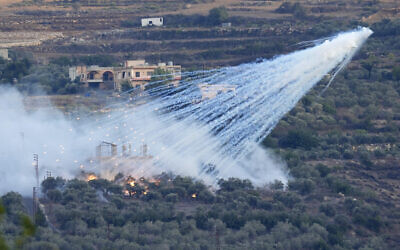 Illustrative A shell explodes over a house in al-Bustan, a Lebanese village along the border with Israel, on October 15, 2023. (AP Photo/Hussein Malla, File)