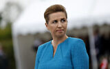 Denmark's Prime Minister Mette Frederiksen attends a ceremony at the Danish monument outside of Sainte Marie du Mont, Normandy, Thursday, June 6, 2024. (AP Photo/Jeremias Gonzalez)