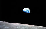 This Dec. 24, 1968, file photo made available by NASA shows the Earth behind the surface of the moon during the Apollo 8 mission (William Anders/NASA via AP, File)