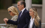 Hunter Biden, center, accompanied by his mother, US First Lady Jill Biden, left, and his wife, Melissa Cohen Biden, right, walking out of federal court after hearing the verdict, June 11, 2024, in Wilmington, Delaware. (AP Photo/Matt Rourke)