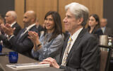 Dr. Julio Frenk, right, smiles as he is confirmed as the next chancellor of the University of California, Los Angeles (UCLA), during a meeting of the regents of the University of California system, June 12, 2024, on the UCLA campus in Los Angeles. (AP Photo/Damian Dovarganes)