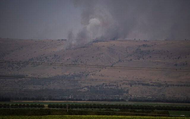 Smoke rises as a fire burns in the Golan Heights following Hezbollah strikes from Lebanon, June 13, 2024. (AP Photo/Leo Correa) Smoke rises as a fire burns in the Golan Heights following Hezbollah strikes from Lebanon, June 13, 2024. (AP Photo/Leo Correa)