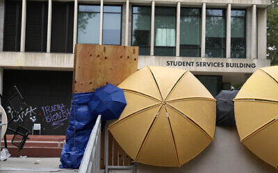 A barricade and graffiti left by anti-Israel protesters at the Student Services Building at California State University in Los Angeles, June 13, 2024. (AP Photo/Damian Dovarganes)