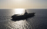 The USS aircraft carrier Dwight D. Eisenhower sails in the Red Sea on June 12, 2024. (AP/Bernat Armangue)