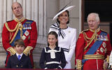 Britain's King Charles III, right, is joined by Prince William, Prince Louis, Princess Charlotte and Kate Princess of Wales on the Balcony at Buckingham Palace after attending the Trooping the Color ceremony, in London, Saturday, June 15, 2024. (AP Photo/Alberto Pezzali)