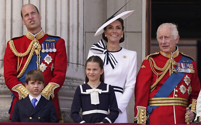 Britain's King Charles III, right, is joined by Prince William, Prince Louis, Princess Charlotte and Kate Princess of Wales on the Balcony at Buckingham Palace after attending the Trooping the Color ceremony, in London, Saturday, June 15, 2024. (AP Photo/Alberto Pezzali)