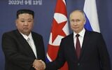 Russian President Vladimir Putin, right, and North Korea's leader Kim Jong Un shake hands during their meeting at the Vostochny cosmodrome in the far eastern Amur region, Russia, on September 13, 2023. (Vladimir Smirnov, Sputnik, Kremlin Pool Photo via AP)