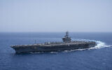 The USS aircraft carrier Dwight D. Eisenhower, also known as 'IKE,' sails in the Red Sea, June 12, 2024. (AP/Bernat Armangue, File)