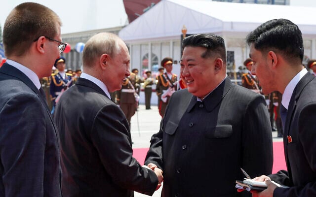 Russian President Vladimir Putin, second left, and North Korea's leader Kim Jong Un, second right, shake hands during the official welcome ceremony in the Kim Il Sung Square in Pyongyang, North Korea, June 19, 2024. (Gavriil Grigorov, Sputnik, Kremlin Pool Photo via AP) Russian President Vladimir Putin, second left, and North Korea's leader Kim Jong Un, second right, shake hands during the official welcome ceremony in the Kim Il Sung Square in Pyongyang, North Korea, June 19, 2024. (Gavriil Grigorov, Sputnik, Kremlin Pool Photo via AP)