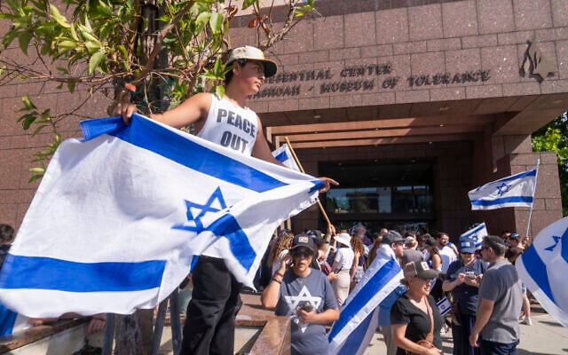 Eldar Avital, 12, left, joins pro-Israel supporters to condemn a violent protest the previous weekend outside Adas Torah synagogue as members of the Jewish community gather at Simon Wiesenthal Center, June 24, 2024, in Los Angeles. (AP Photo/Damian Dovarganes) Eldar Avital, 12, left, joins pro-Israel supporters to condemn a violent protest the previous weekend outside Adas Torah synagogue as members of the Jewish community gather at Simon Wiesenthal Center, June 24, 2024, in Los Angeles. (AP Photo/Damian Dovarganes)