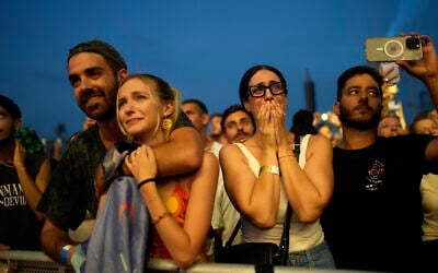 Participants at the Nova Healing Concert in Tel Aviv, Israel, on Thursday, June 27, 2024. This was the first Tribe of Nova mass gathering since the Oct. 7, 2023 cross-border attack by Hamas terrorists who killed hundreds at the Nova music festival and kidnapped others to Gaza. (AP Photo/Ohad Zwigenberg)