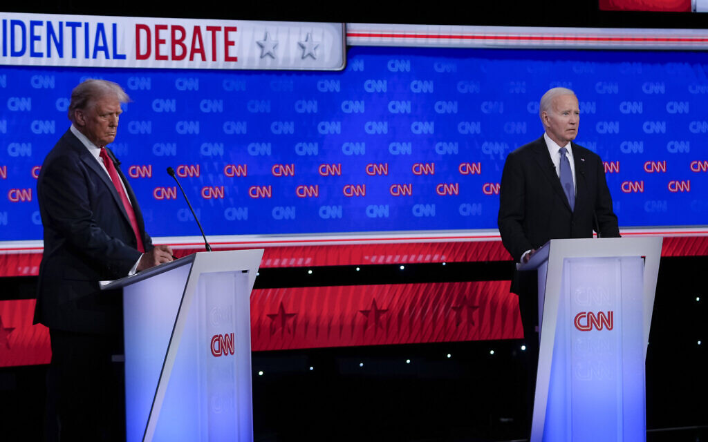 US President Joe Biden, right, and Republican presidential candidate former president Donald Trump, left, during a presidential debate hosted by CNN, June 27, 2024, in Atlanta. (AP/Gerald Herbert)