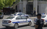 Police officers block off traffic at an intersection close to the Israeli embassy in Belgrade, Serbia, June 29, 2024. (AP Photo/Marko Drobnjakovic)