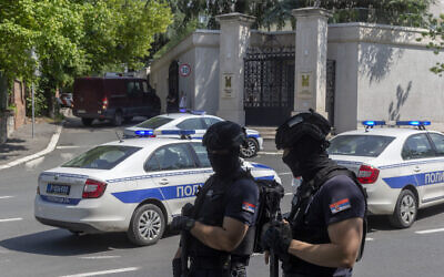 Police officers block off traffic at an intersection close to the Israeli embassy in Belgrade, Serbia, after a terrorist attack there, June 29, 2024. (AP Photo/Marko Drobnjakovic)
