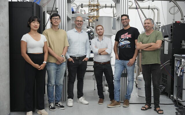 Nir Alfasi, Science Lead at the Israeli Quantum Computing Center (second from right) with the Quantum Machines team operating the new lab based at Tel Aviv University. (Dima Karminsky) Nir Alfasi, Science Lead at the Israeli Quantum Computing Center (second from right) with the Quantum Machines team operating the new lab based at Tel Aviv University. (Dima Karminsky)