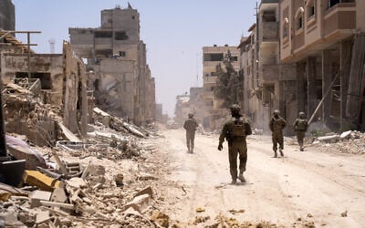 Troops of the IDF's Givati Brigade operate in the Yabna camp of southern Gaza's Rafah, June 18, 2024. (Emanuel Fabian/Times of Israel)