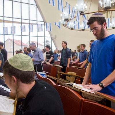 Students pray at Mercaz Harav yeshiva in Jerusalem, May 11, 2015. (Yonatan Sindel/Flash90) Students pray at Mercaz Harav yeshiva in Jerusalem, May 11, 2015. (Yonatan Sindel/Flash90)