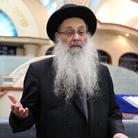 Rabbi Moshe Maya speaks during a rally marking one year since the death of Rabbi Shimon Hirari in Tel Aviv on February 28, 2016. (Yaacov Cohen/Flash90)