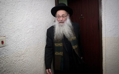 Rabbi Moshe Maya leaves the venue of a meeting of the Shas Torah Sages Council in Jerusalem on February 20, 2019. (Yonatan Sindel/Flash90)