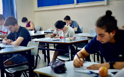 Illustrative photo of Israeli high school students taking an exam, in Tel Aviv on June 29, 2020. (Avshalom Sassoni/Flash90)