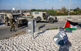 Illustrative: Israeli soldiers guard near Qalqilya on August 12, 2022. (Nasser Ishtayeh/Flash90)