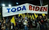 Protesters hold large banner reading "Thank you, Biden," during a march in support of a hostage deal in Jerusalem on June 1, 2024. (Yonatan Sindel/Flash90)