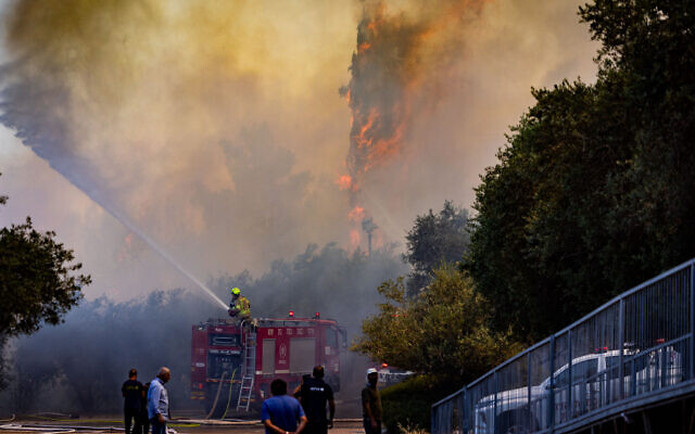 Firefighters work to extinguish a fire that broke out near the Israel Museum in Jerusalem, June 2, 2024. (Chaim Goldberg/Flash90) Firefighters work to extinguish a fire that broke out near the Israel Museum in Jerusalem, June 2, 2024. (Chaim Goldberg/Flash90)