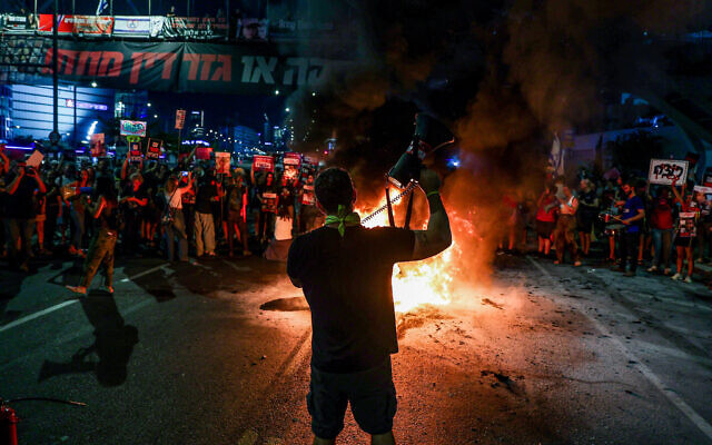 Illustrative: Protesters call for the release of Israeli hostages held in the Gaza Strip outside the Kirya military headquarters in Tel Aviv, June 5, 2024. (Itai Ron/Flash90) Illustrative: Protesters call for the release of Israeli hostages held in the Gaza Strip outside the Kirya military headquarters in Tel Aviv, June 5, 2024. (Itai Ron/Flash90)