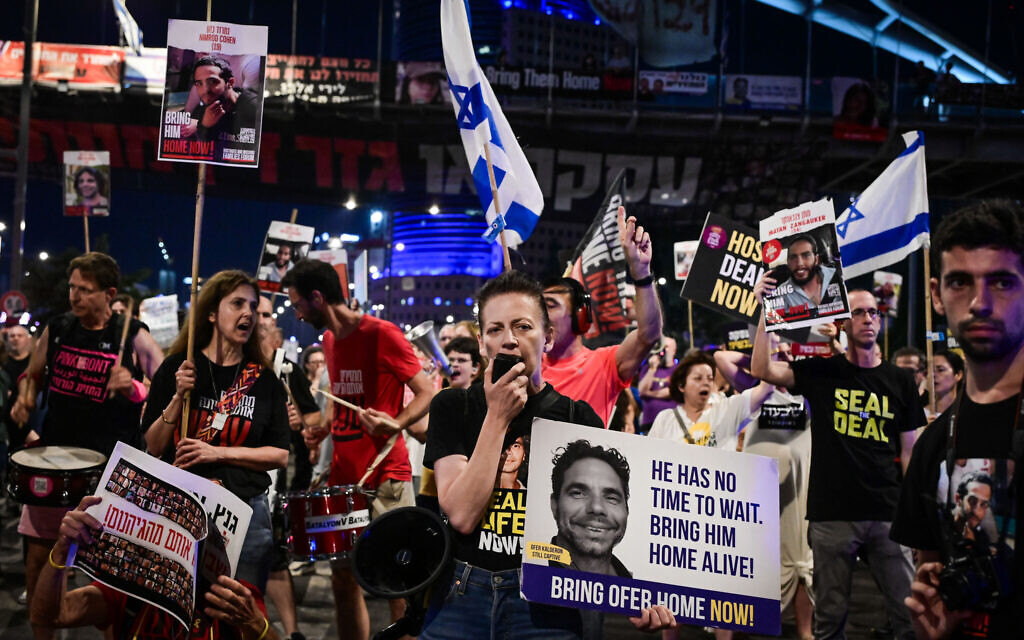 Protesters call for the release of the hostages held by terrorists in the Gaza Strip, outside the Kirya military headquarters in Tel Aviv, June 12, 2024. (Avshalom Sassoni/Flash90)