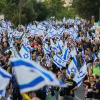 Israelis protest against the government and call for early elections, near the Knesset in Jerusalem on June 18, 2024. (Noam Revkin Fenton/Flash90)