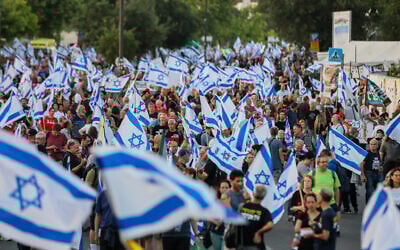 Israelis protest against the government and call for early elections, near the Knesset in Jerusalem on June 18, 2024. (Noam Revkin Fenton/Flash90)