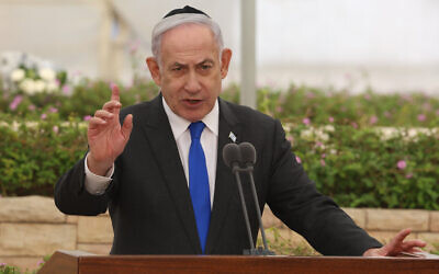 Prime Minister Benjamin Netanyahu attends a ceremony for the victims of the 1948 Altalena incident, at Nachalat Yitzhak cemetery in Tel Aviv. June 18, 2024. (Shaul Golan/Pool/Flash90)