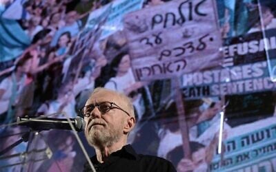 Author David Grossman speaks during a protest against Prime Minister Benjamin Netanyahu and the current government outside the Kirya military base in Tel Aviv, June 22, 2024. (Tomer Neuberg/Flash90)