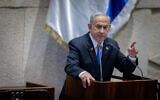 Prime Minister Benjamin Netanyahu attends a debate at the Knesset in Jerusalem, June 24, 2024 (Chaim Goldberg/Flash90)