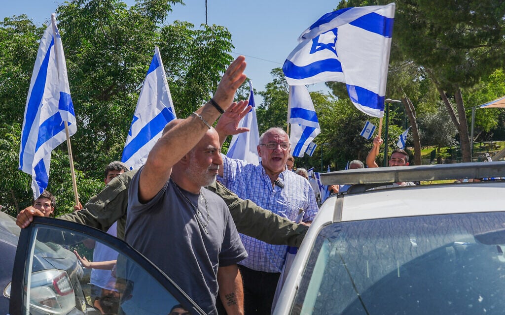 Released hostage Shlomi Ziv returning to his home in Moshav Elkosh in the north, June 25, 2024. (Ayal Margolin/Flash90)