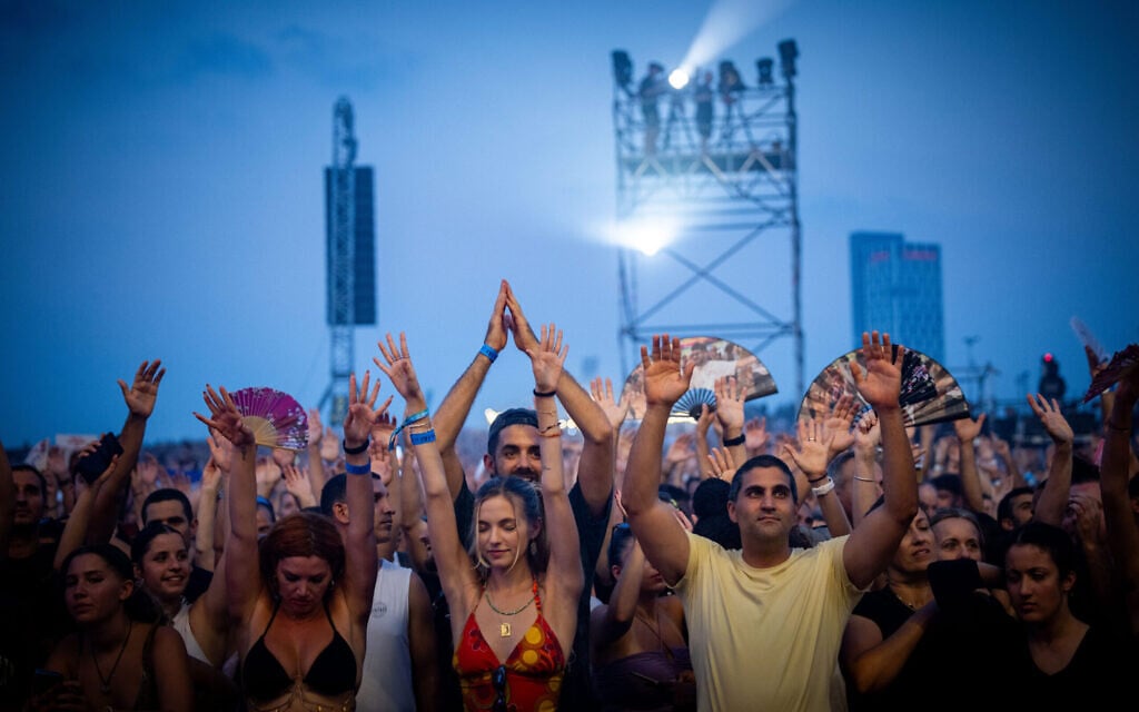 Thousands attend a party in Tel Aviv in memory of the victims murdered at the Reim-area Nova festival by Hamas terrorists on October 7, in Tel Aviv, June 27, 2024. (Yonatan Sindel/Flash90)