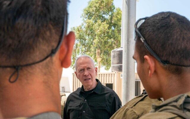 This handout photo shows Defense Minister Yoav Gallant speaking with troops of the elite Yahalom combat engineering unit on June 11, 2024. (Ariel Hermoni/Defense Ministry)